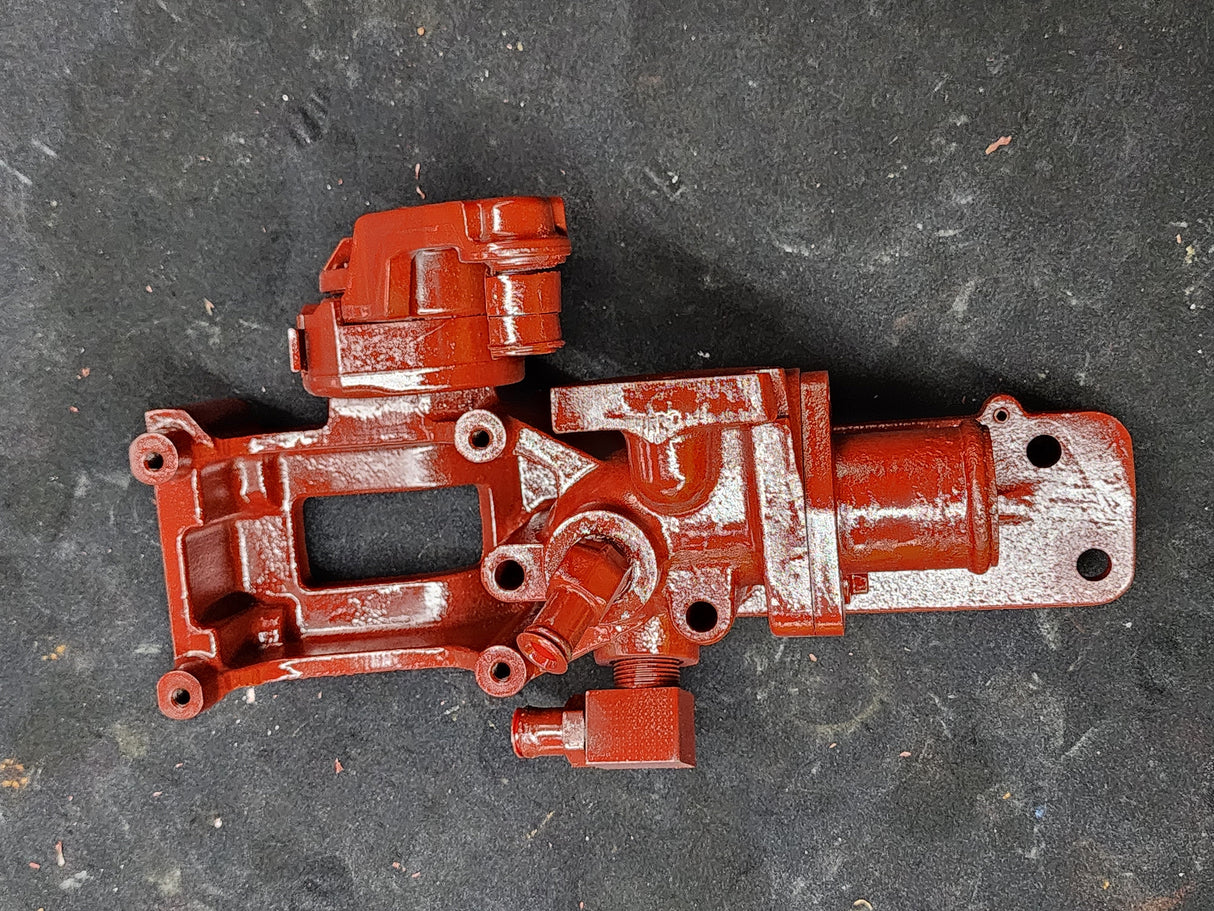 Cummins ISB 6.7L Water Outlet/Alternator Bracket, Water Inlet Connection, & Belt Tensioner For Sale