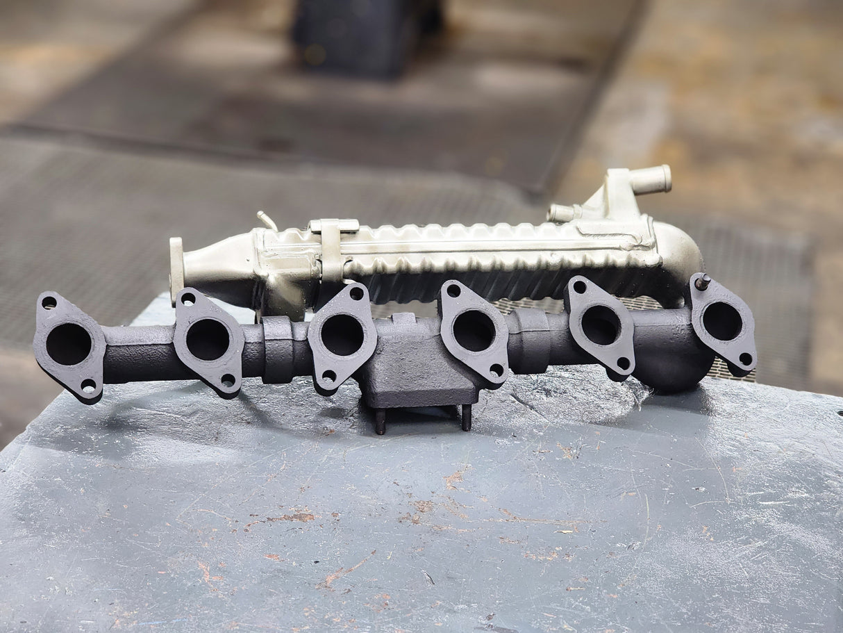 International DT466E Exhaust Manifold w/ EGR Cooler Part # 1844944C1, 1844324C2, 1844964C1