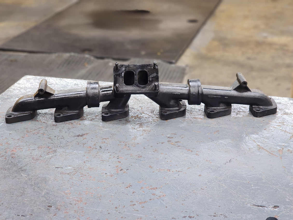 Mack E7 Exhaust Manifold 3-Part For Sale, OEM End Part Casting # 104GC5203AM, 104GC5203M