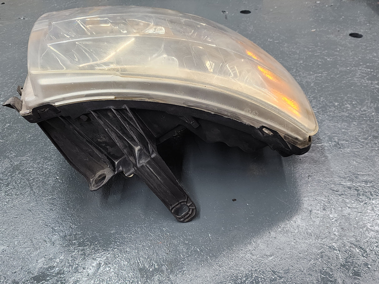 Automotive Lighting GM OEM Passenger (RIGHT) Side Front Headlight 25798851