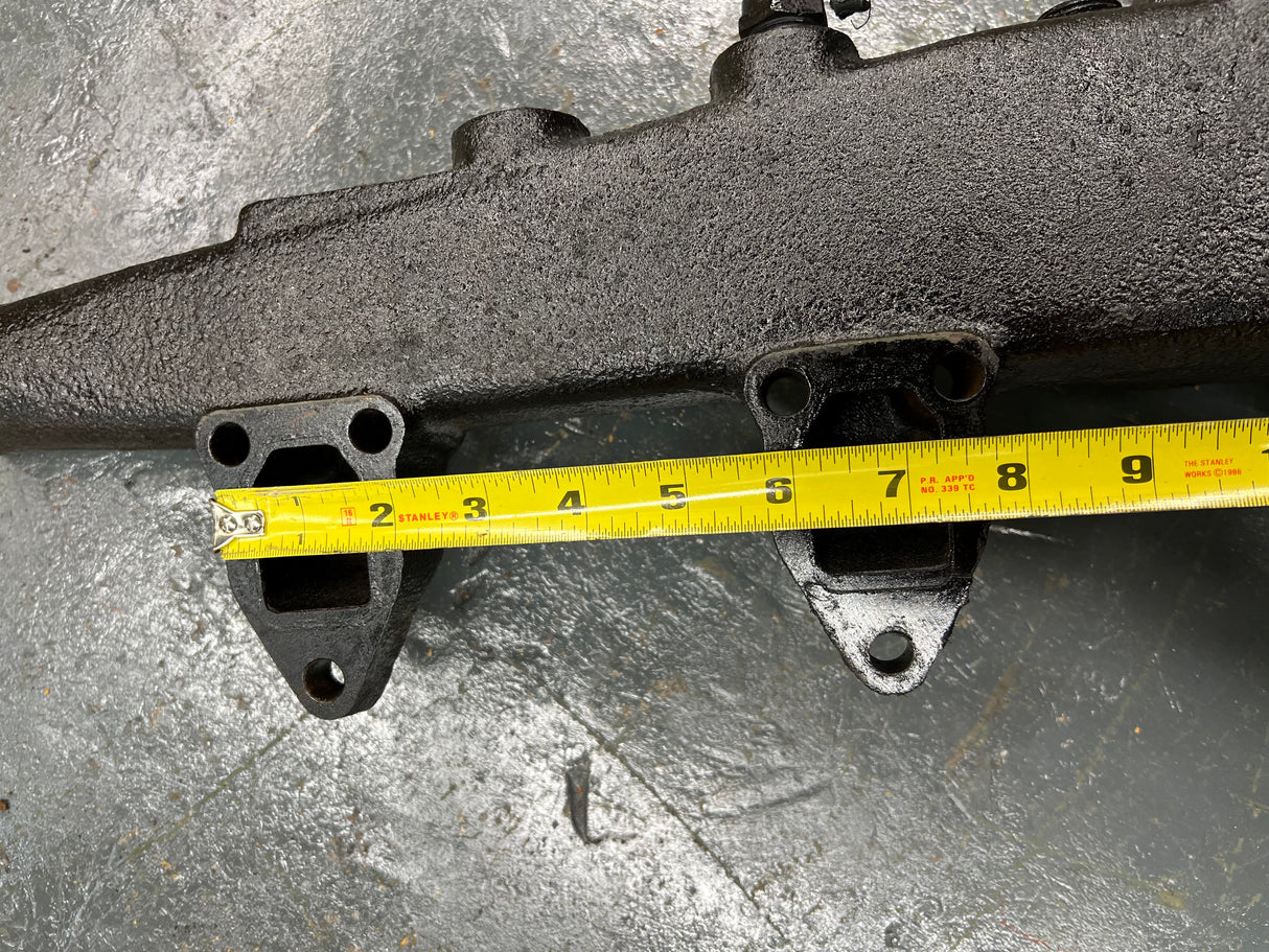 Mack E7 WATER MANIFOLD PART # 107GC550M, W/ OIL FILTER HEAD PART # 32GB354P