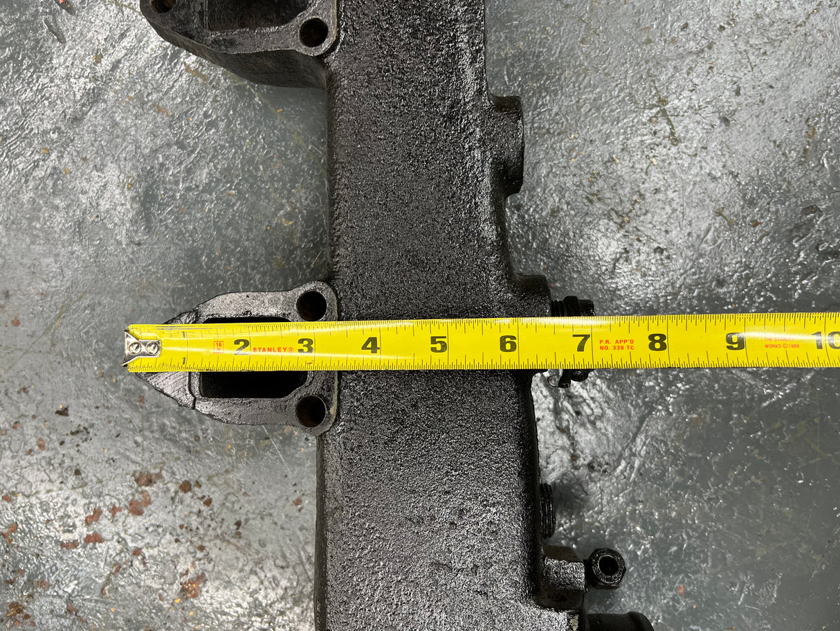 Mack E7 WATER MANIFOLD PART # 107GC550M, W/ OIL FILTER HEAD PART # 32GB354P