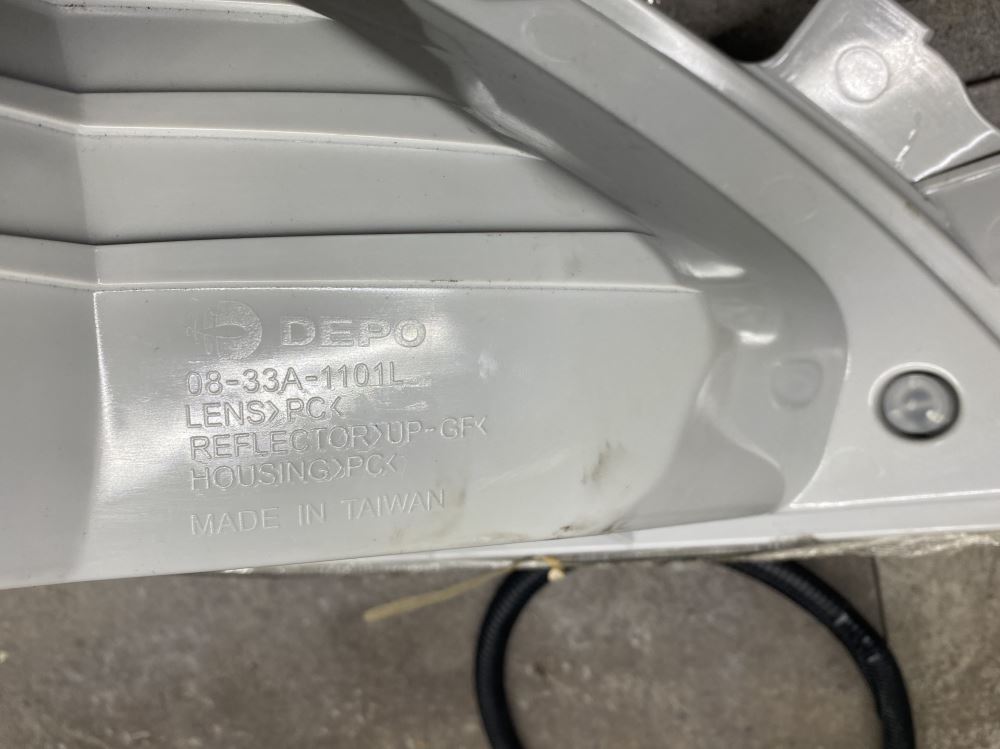 Depo 08-33A-1101L International Headlight