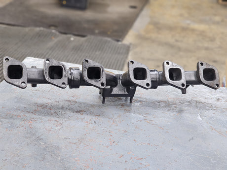 Mack E7 Exhaust Manifold 3-Part For Sale, OEM End Part Casting # 104GC5203AM, 104GC5203M