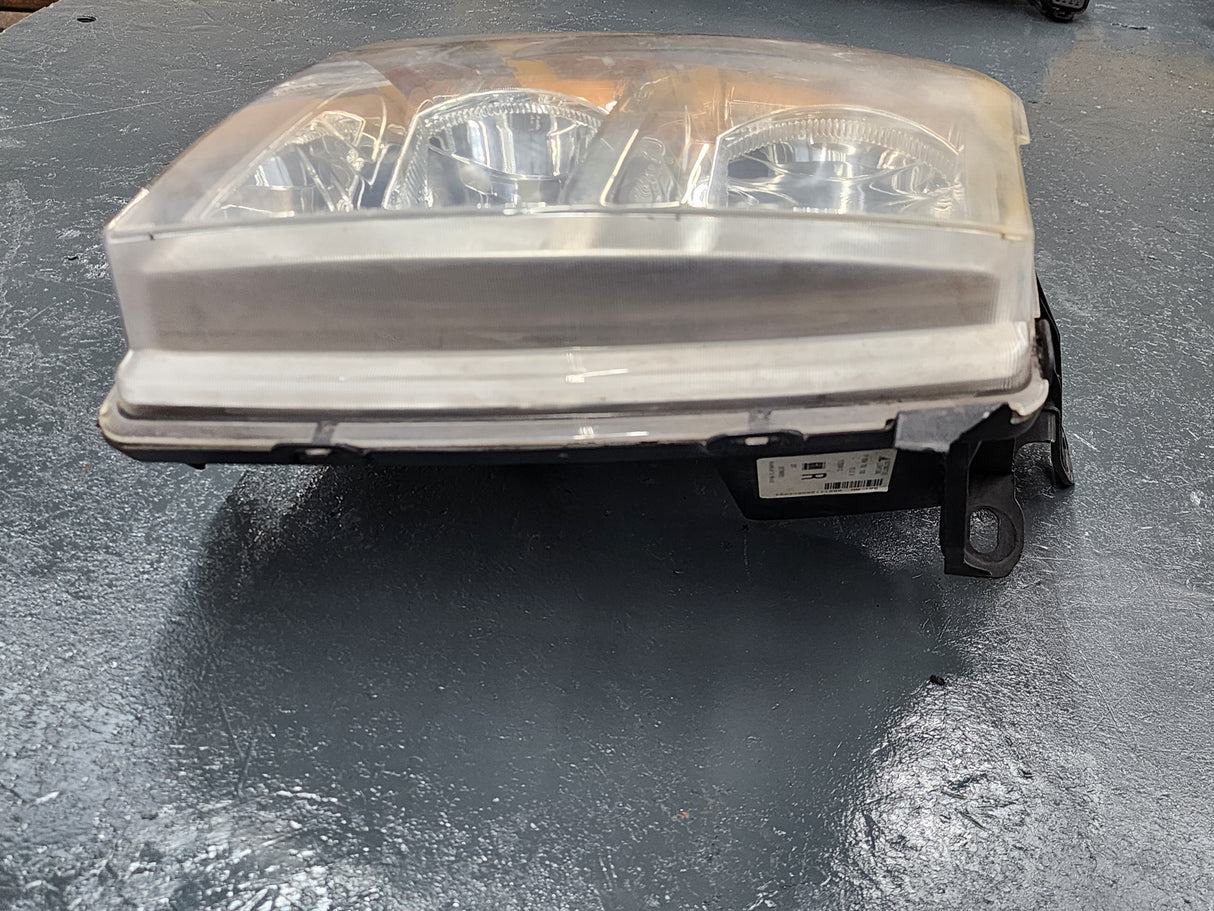 Automotive Lighting GM OEM Passenger (RIGHT) Side Front Headlight 25798851